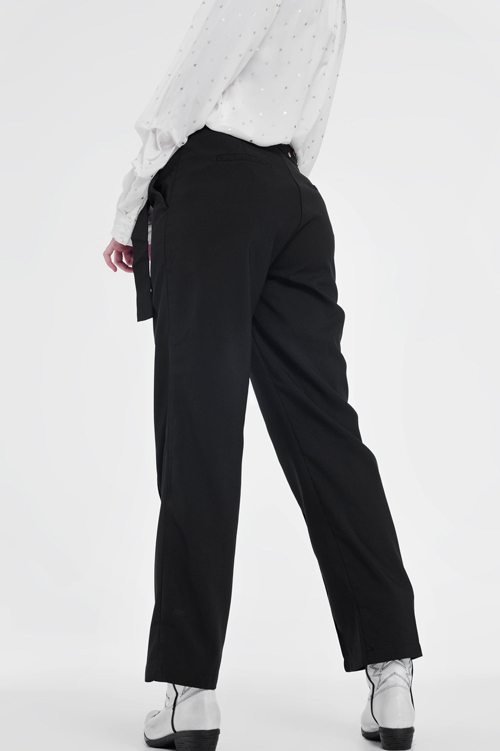 Black pants with wide legs and low hemPants