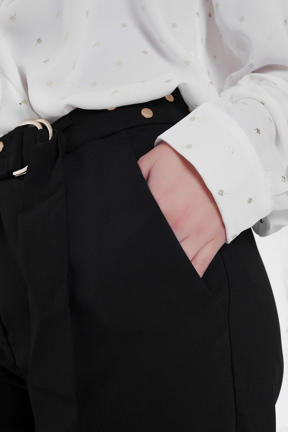 Black pants with wide legs and low hemPants