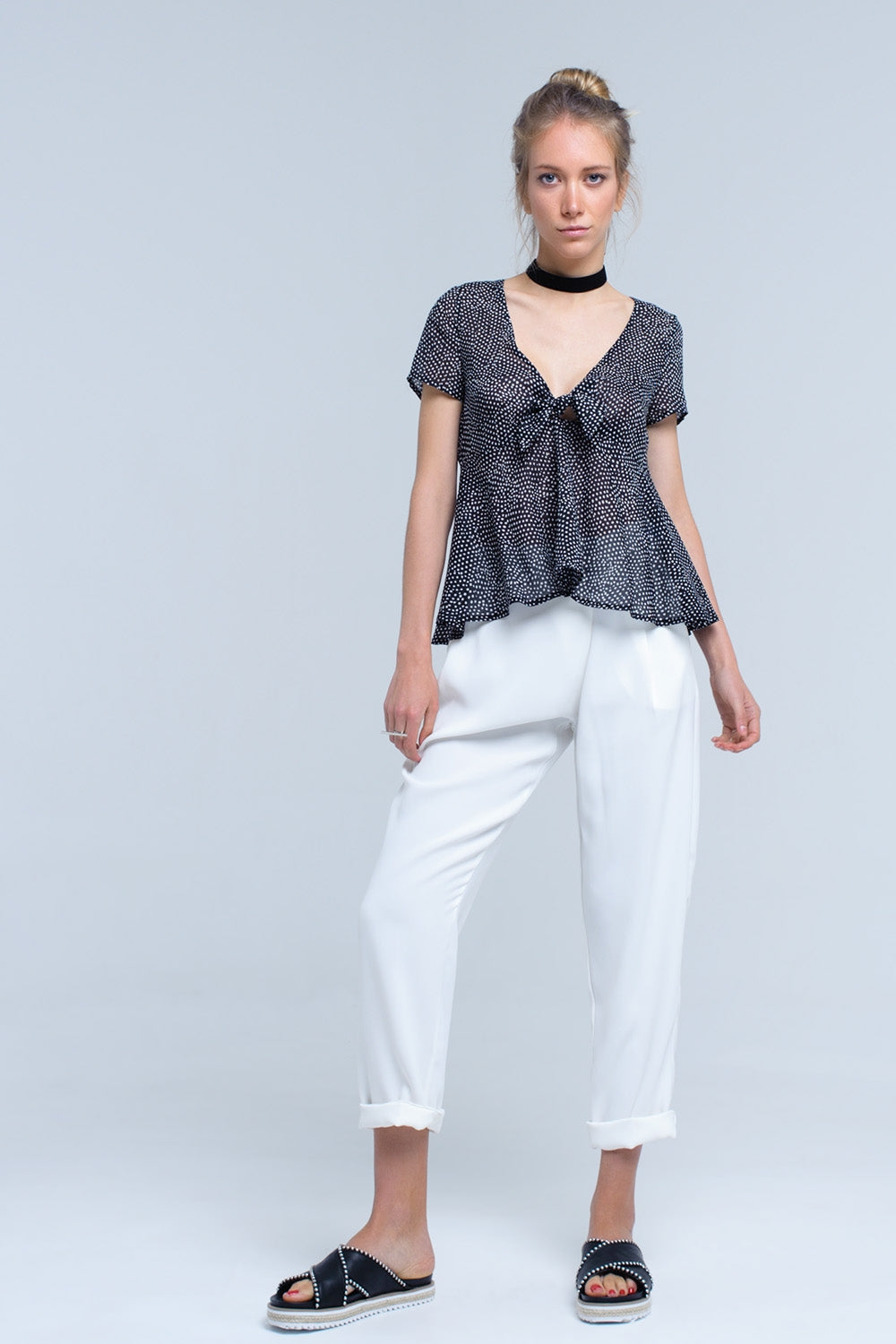 Black polka dot top with ruffle hemShort Sleeve Tops
