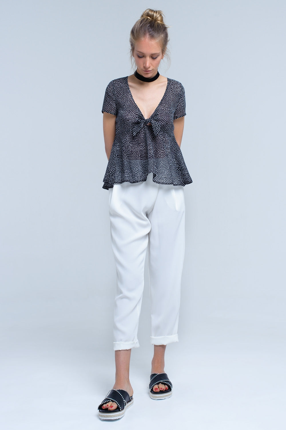 Black polka dot top with ruffle hemShort Sleeve Tops