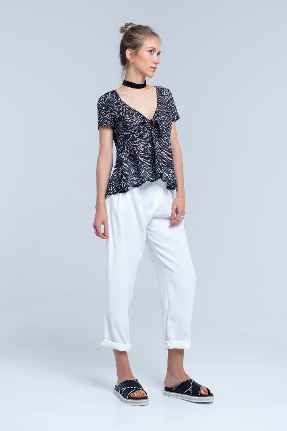 Black polka dot top with ruffle hemShort Sleeve Tops