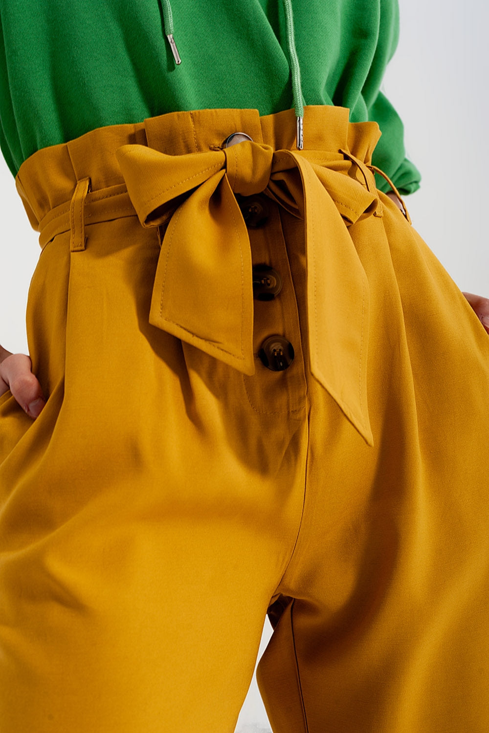High waist belted paperbag trousers in yellowPants