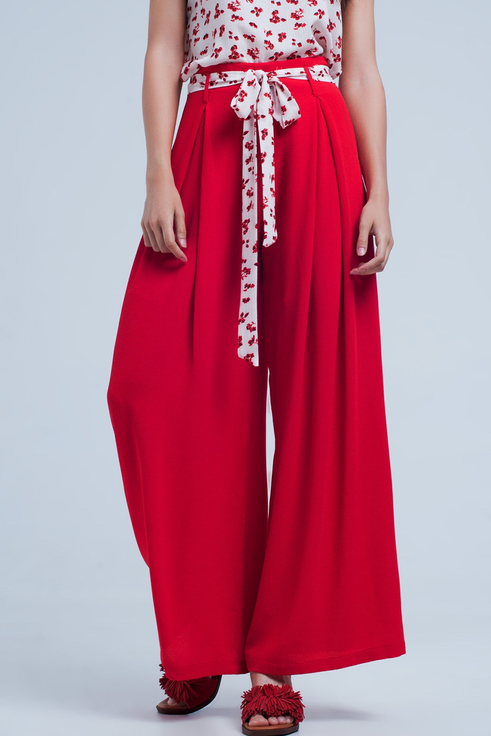 Red pants with floral beltPants