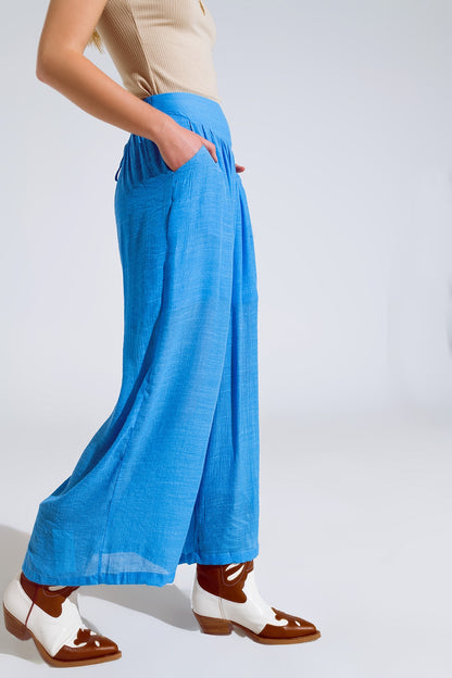 Blue Palazzo style Pants With Side Pockets And Thick Waist Band