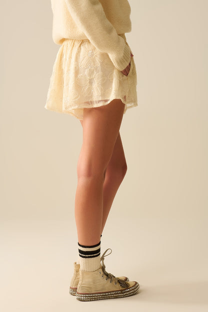 Cream embroidered shorts with sequins