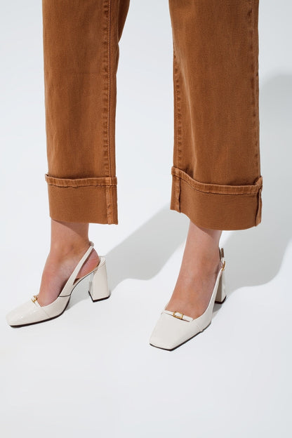 Straight leg jeans in camel with folded trouser legs