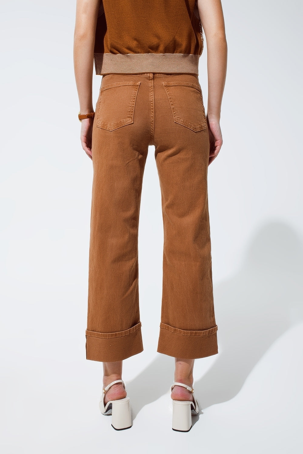 Straight leg jeans in camel with folded trouser legs