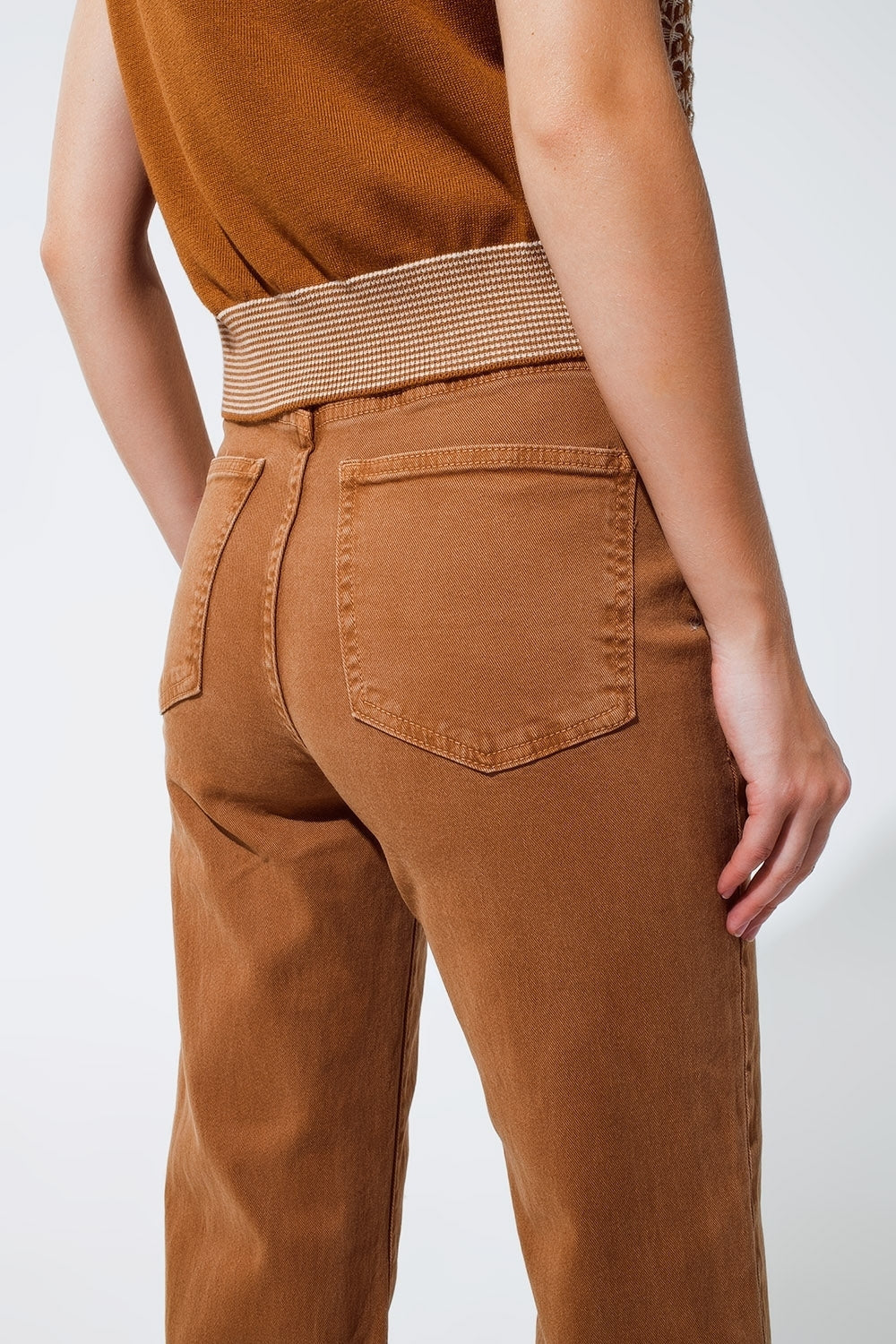 Straight leg jeans in camel with folded trouser legs