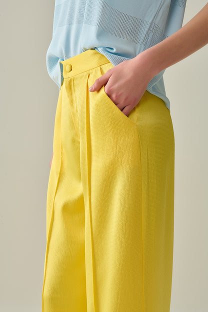 yellow wide leg pants in textured satin