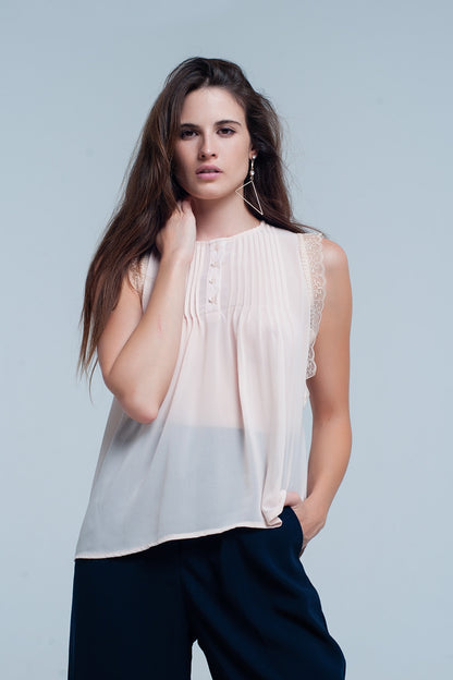 Q2 Beige sleeveless top with lace details