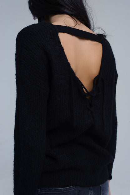 Black knitted sweater with tie-back closureSweaters