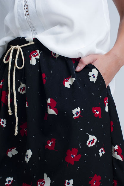 Black mini skirt with floral patternSkirts