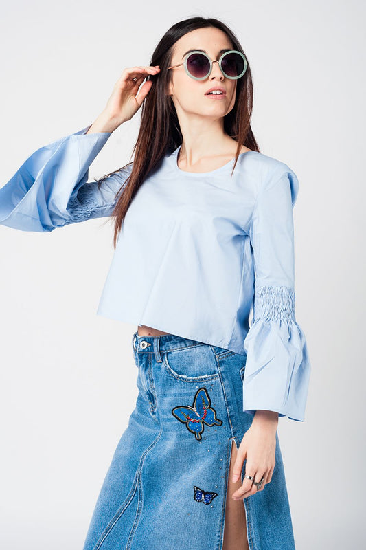 Q2 Blue crop top with fluted sleeves