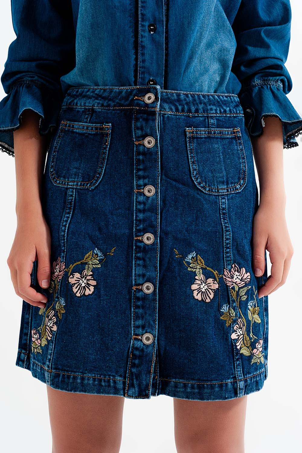 Denim skirt with flower embroidery and front buttonsSkirts