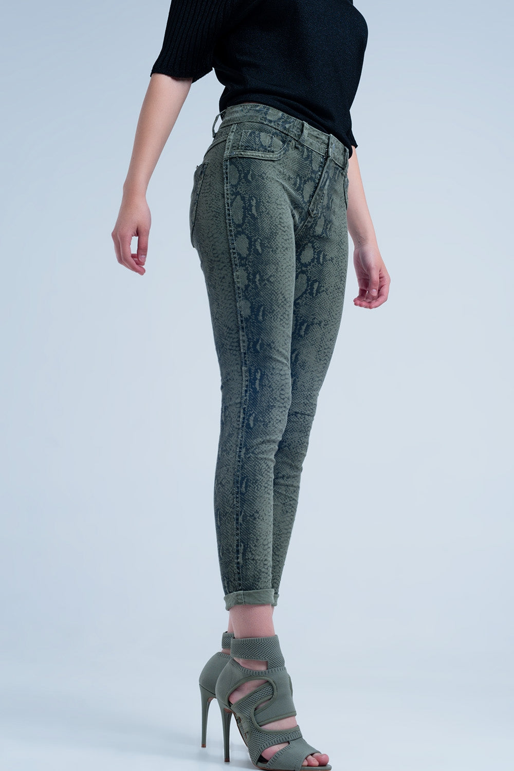 Q2 Green skinny reversible jeans with snake print