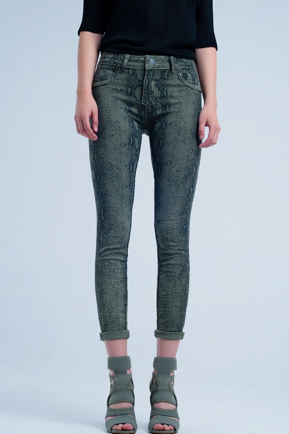 Green skinny reversible jeans with snake printJeans