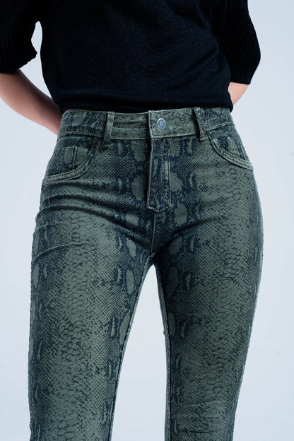 Green skinny reversible jeans with snake printJeans