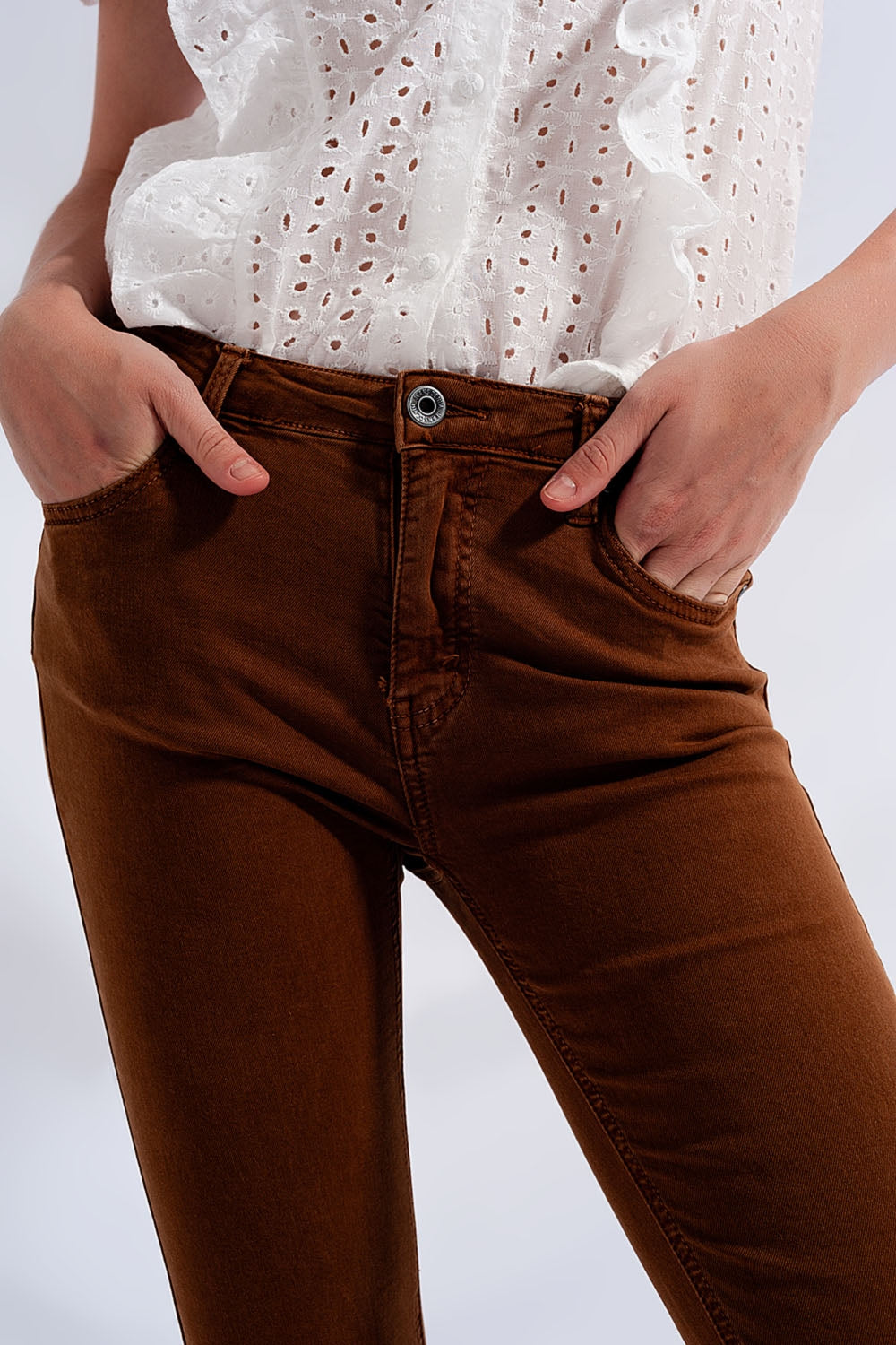 High rise raw hem flared jeans in brownJeans