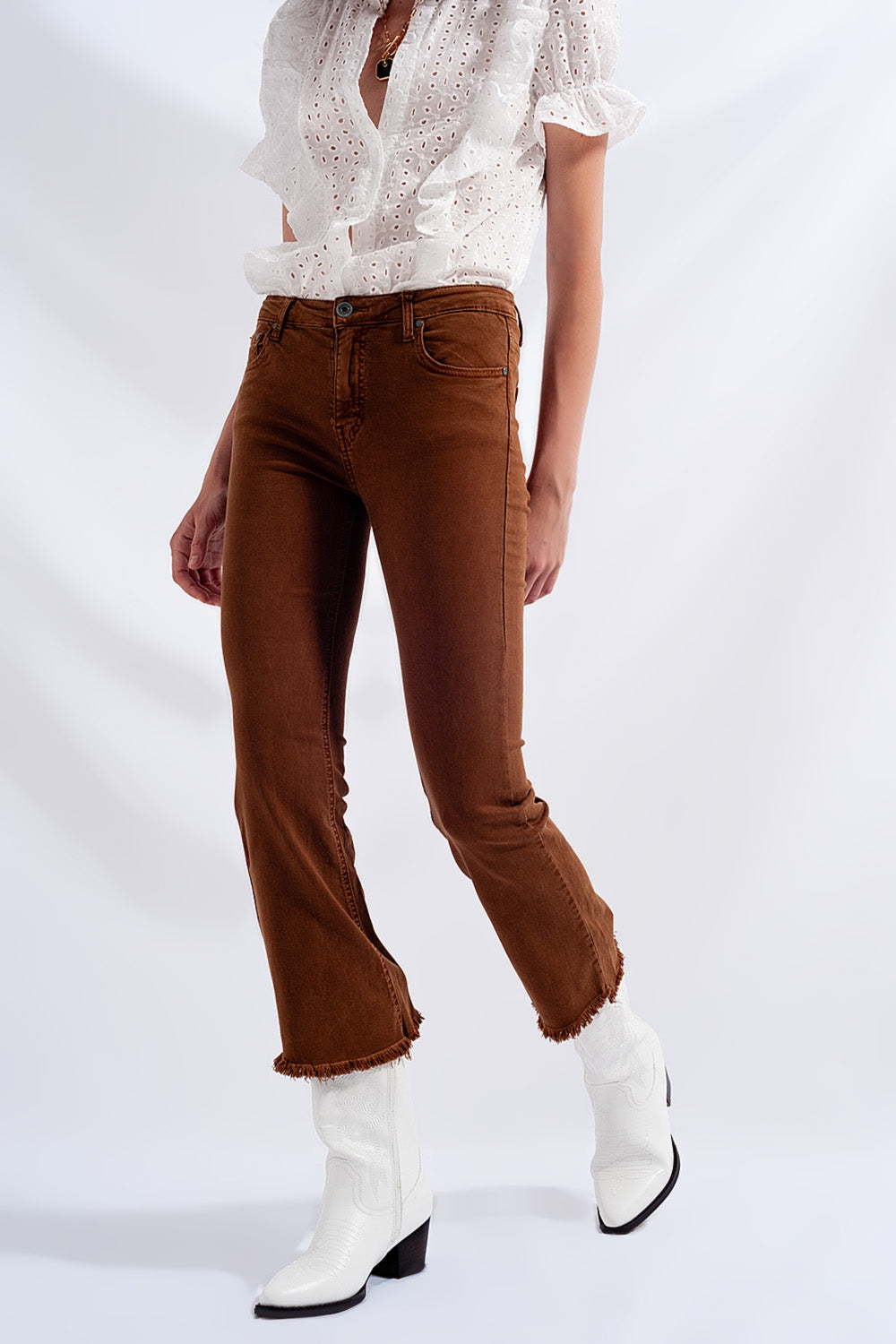 High rise raw hem flared jeans in brownJeans