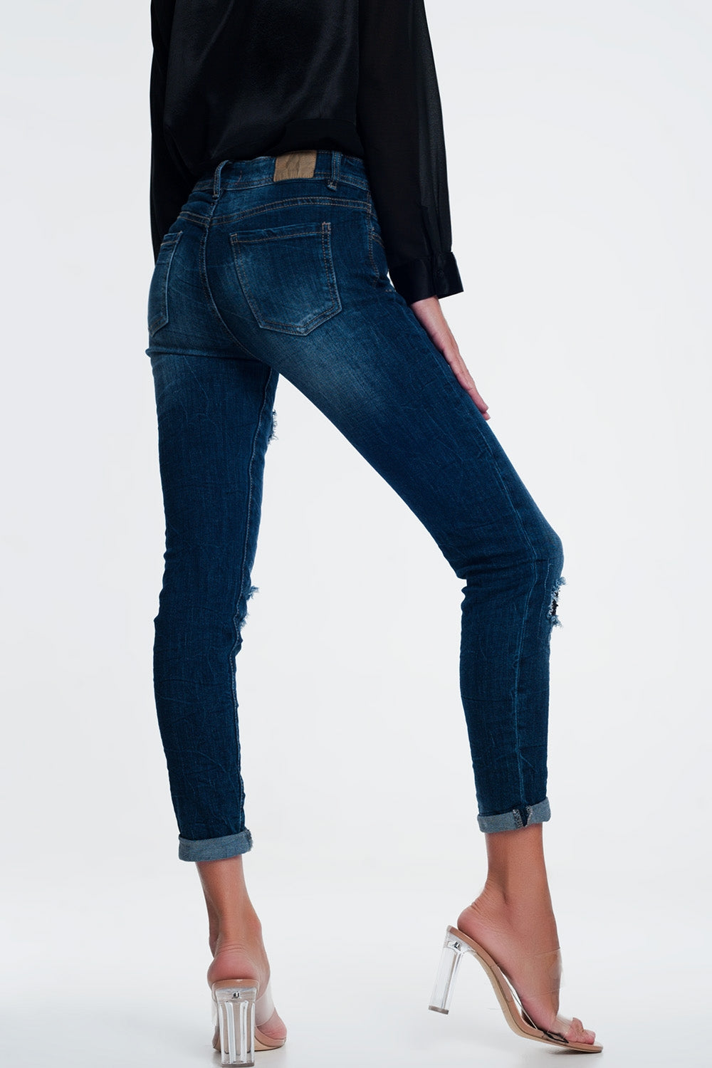 Jeans with sequins and ripsJeans