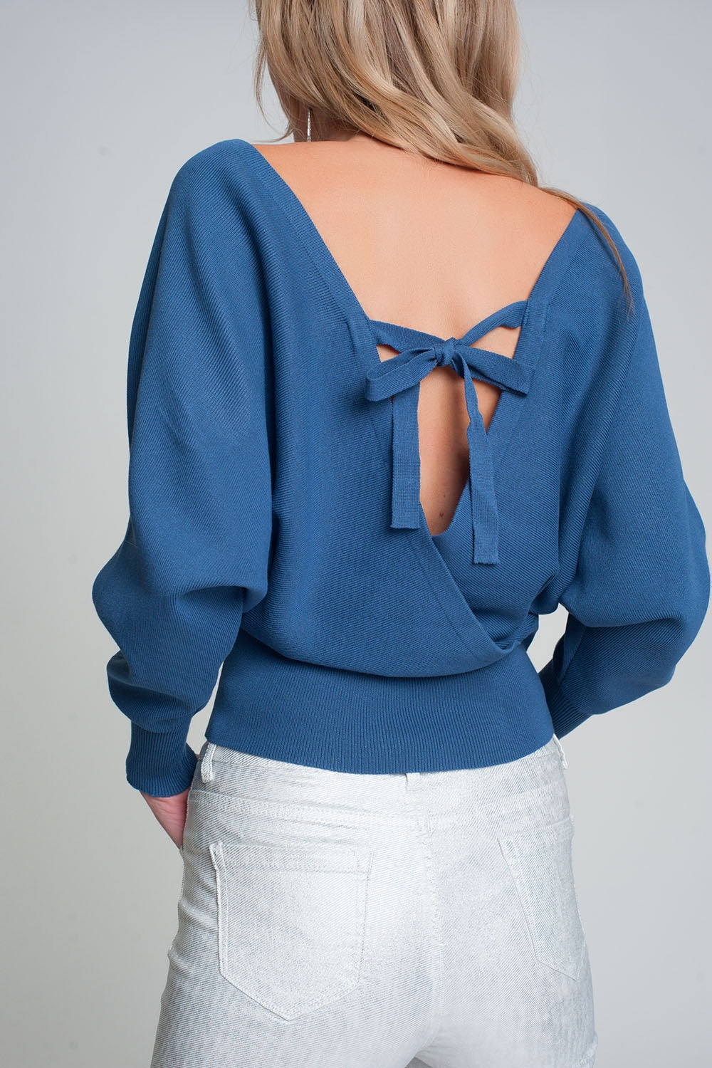 Knitted sweater with wrapped V-neck in blueSweaters