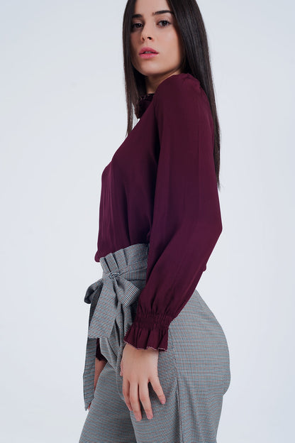 Maroon shirt with neck and sleeve detailed endsBlouses