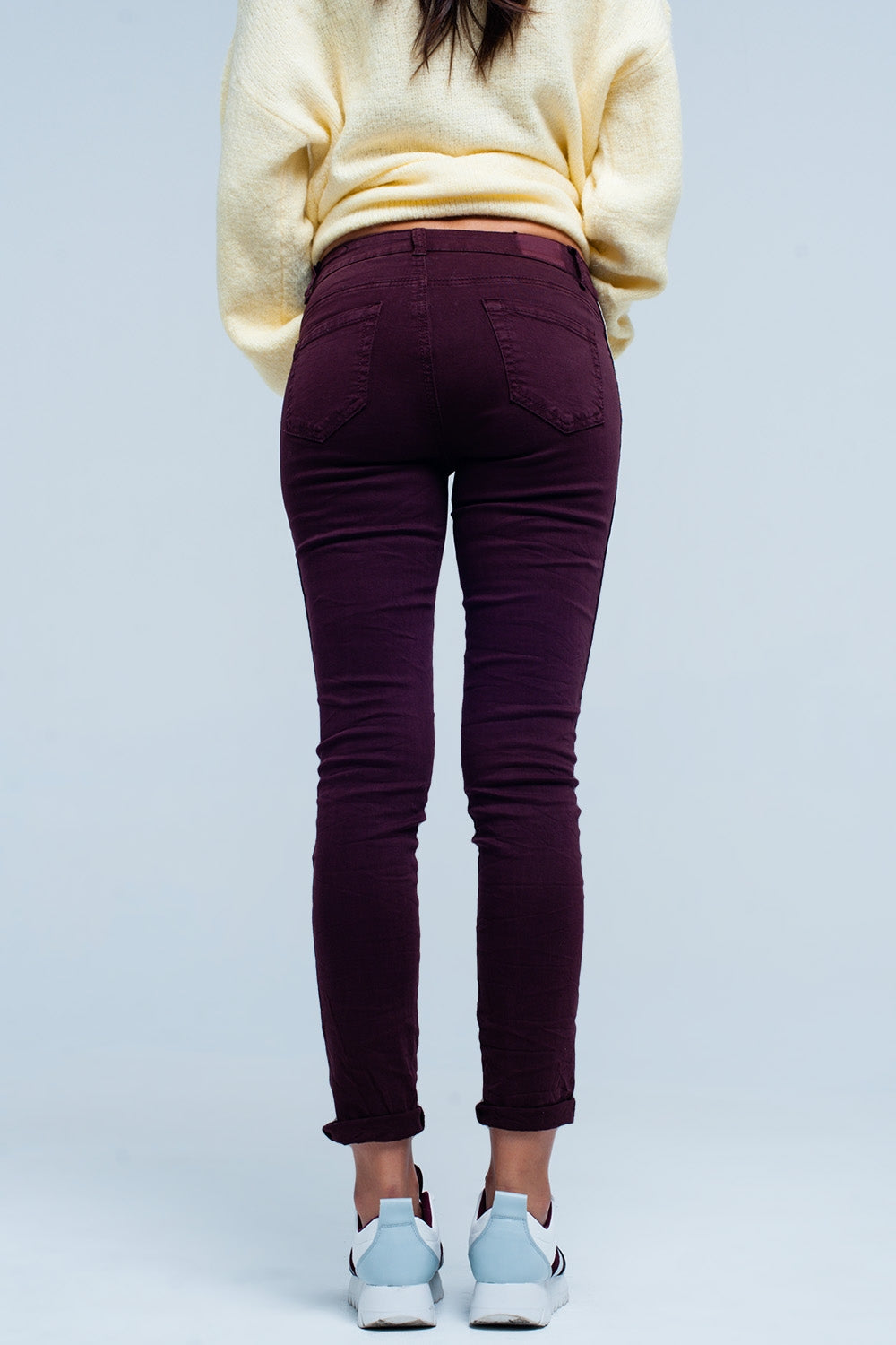 Maroon skinny jeans with metal side stripeJeans