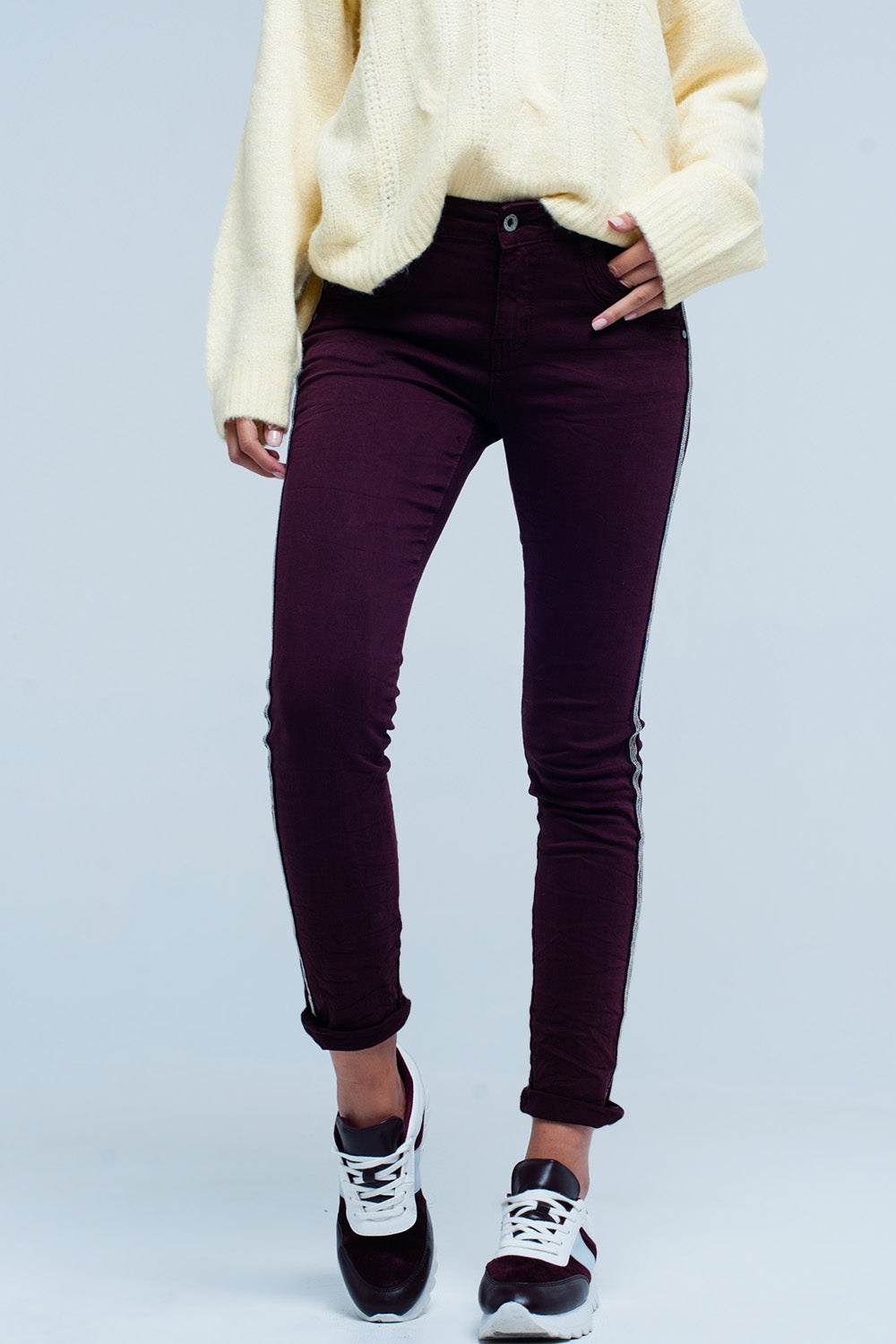 Maroon skinny jeans with metal side stripeJeans