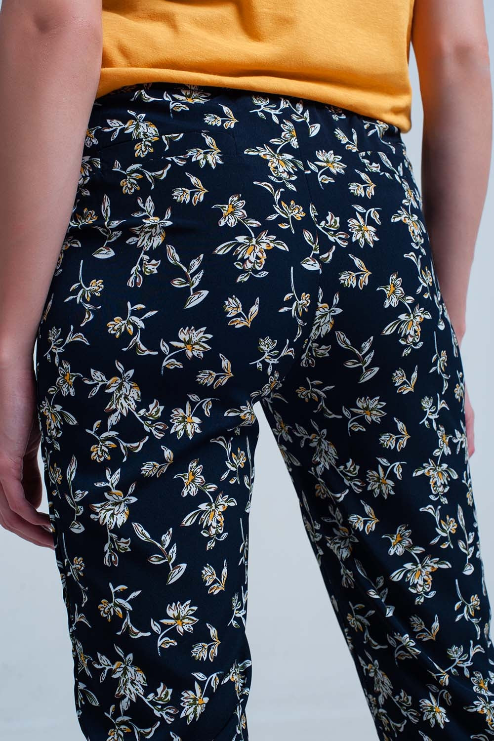 Navy floral pants with a beltPants