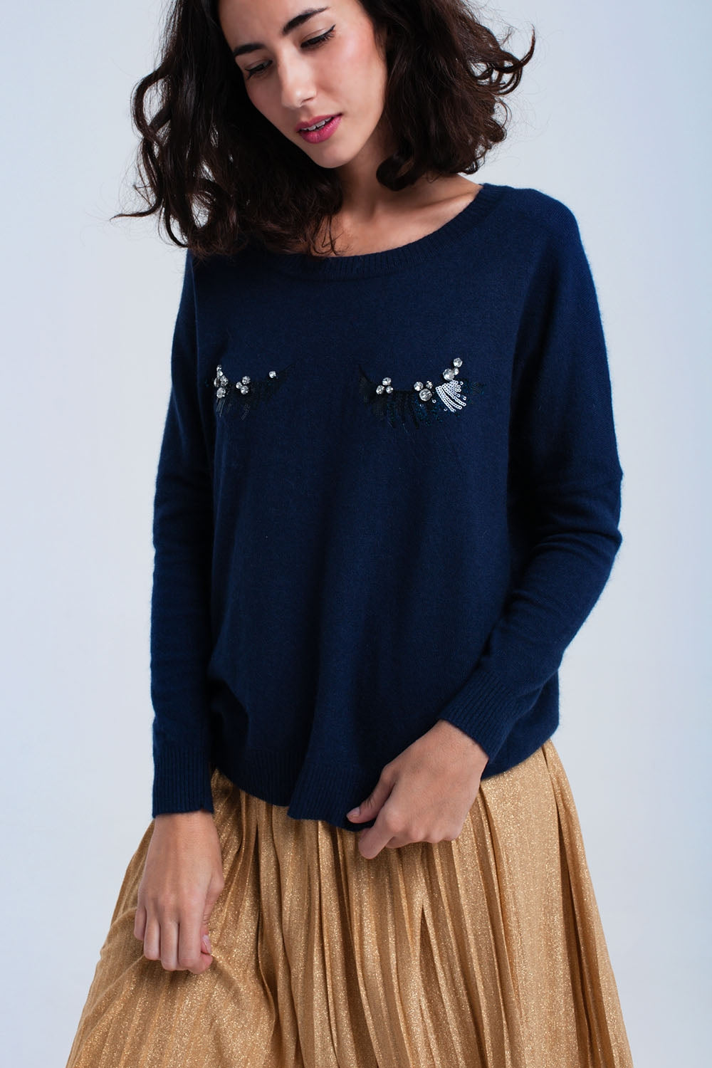 Q2 Navy sweater with eyelashes