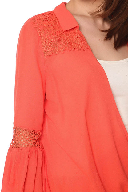 Orange blouse with wrap front and draped detailBlouses