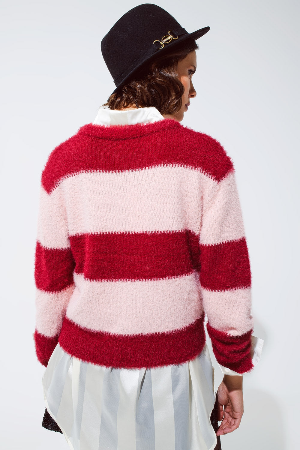 Pink sweater with stripes and a crew neck