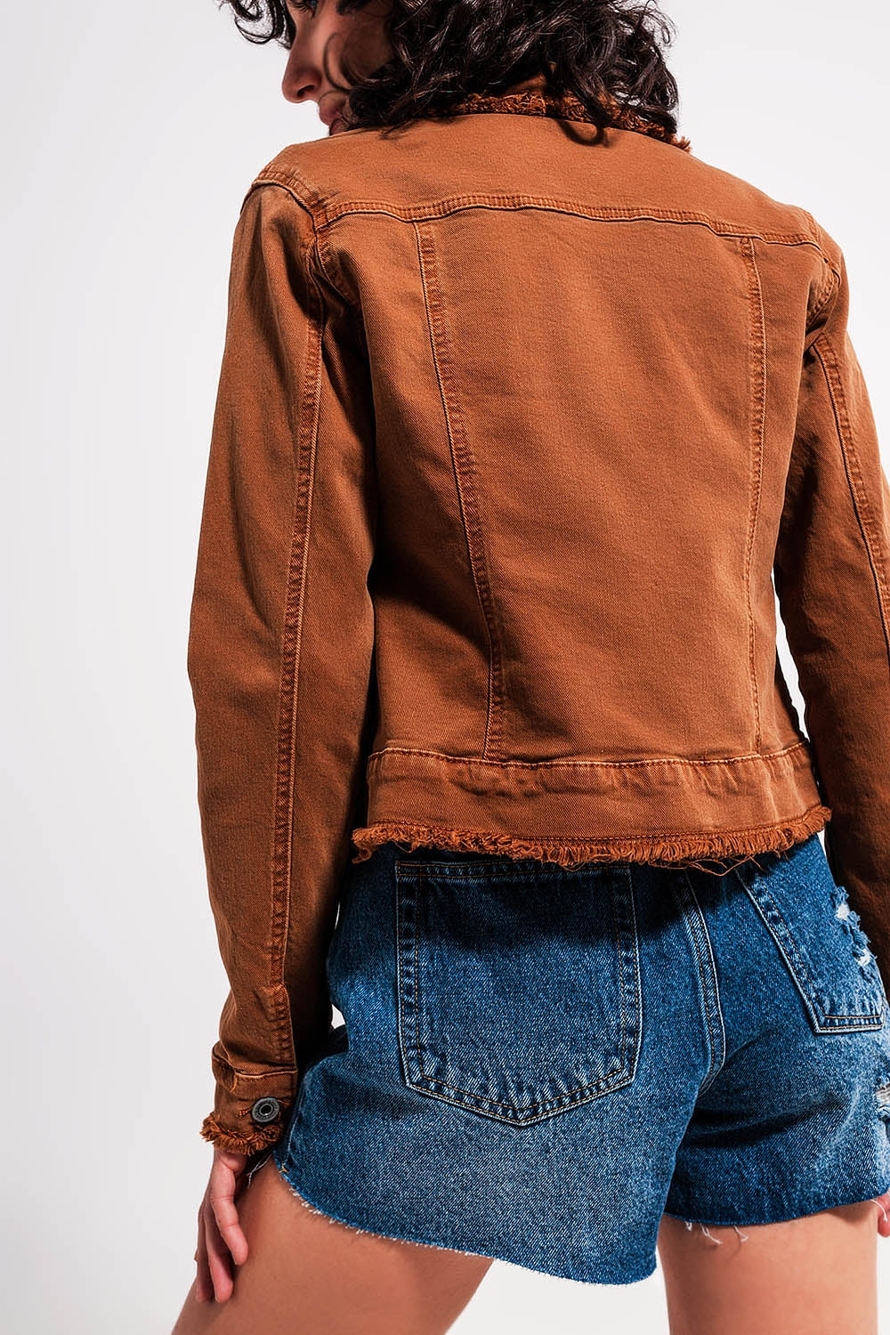 Raw edge denim jacket in brown