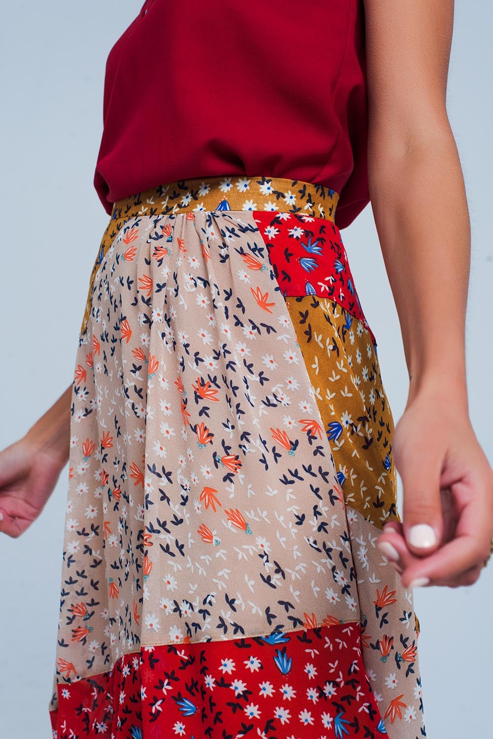 Red floral meadow bias cut midi skirtSkirts