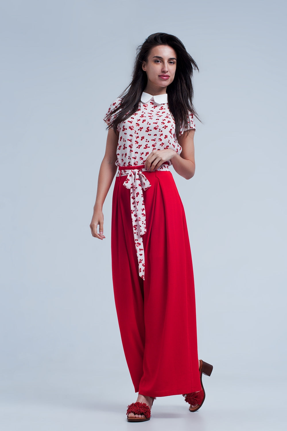 Red pants with floral beltPants