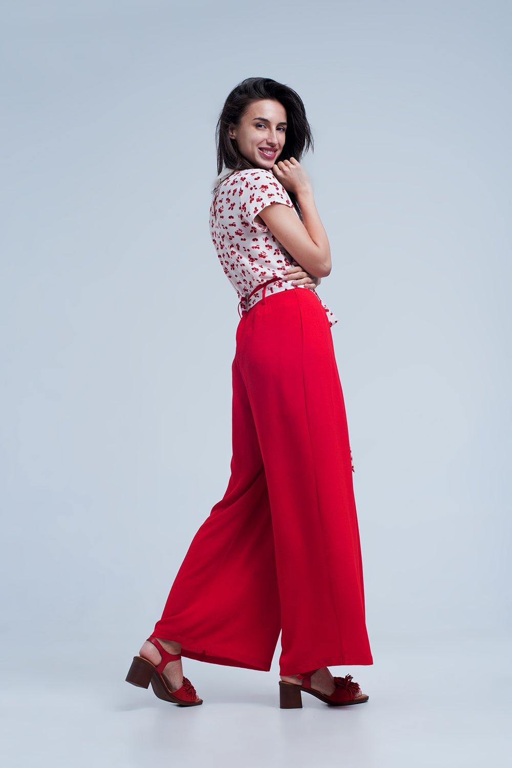 Red pants with floral beltPants