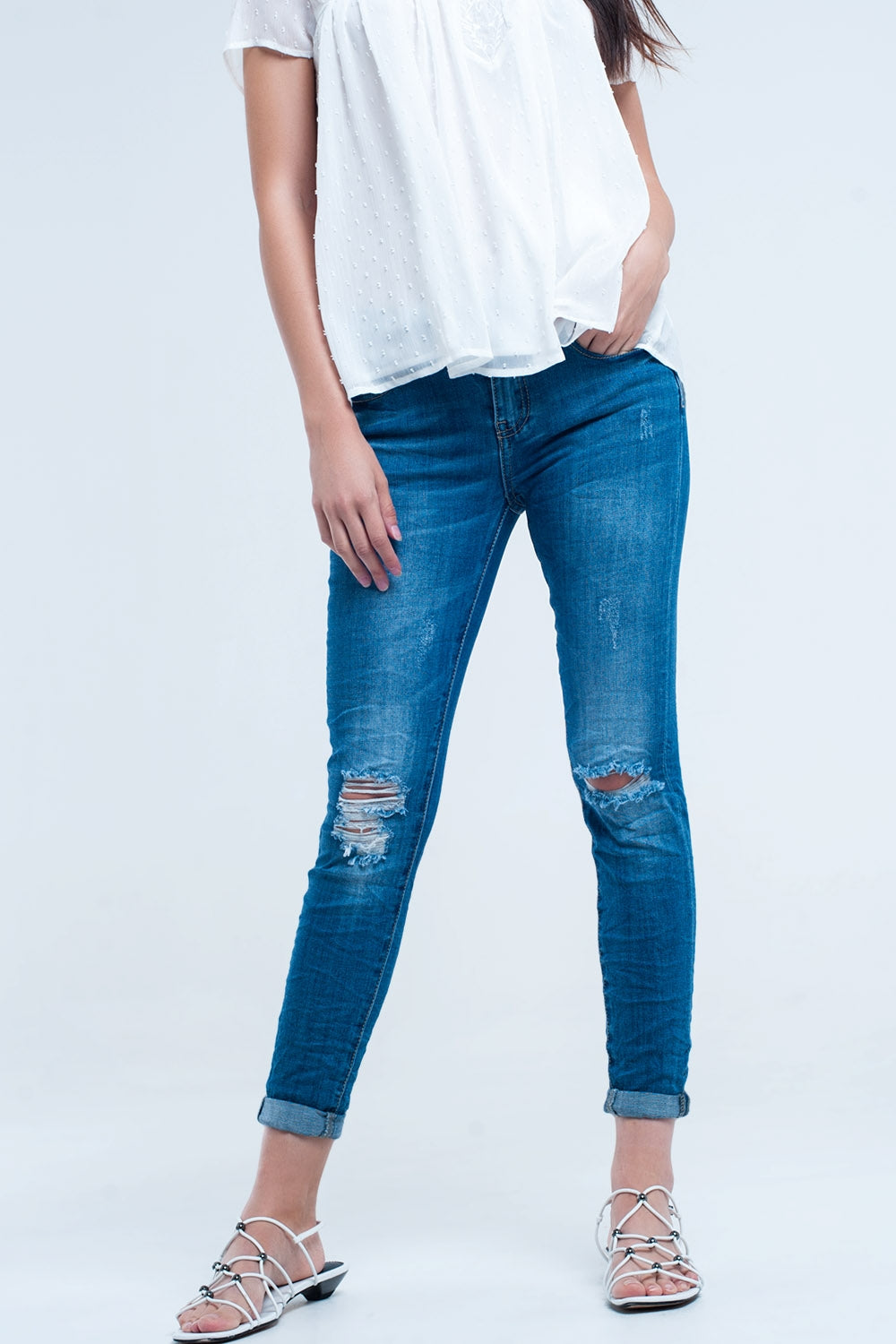 Q2 Skinny elastic jeans with rips