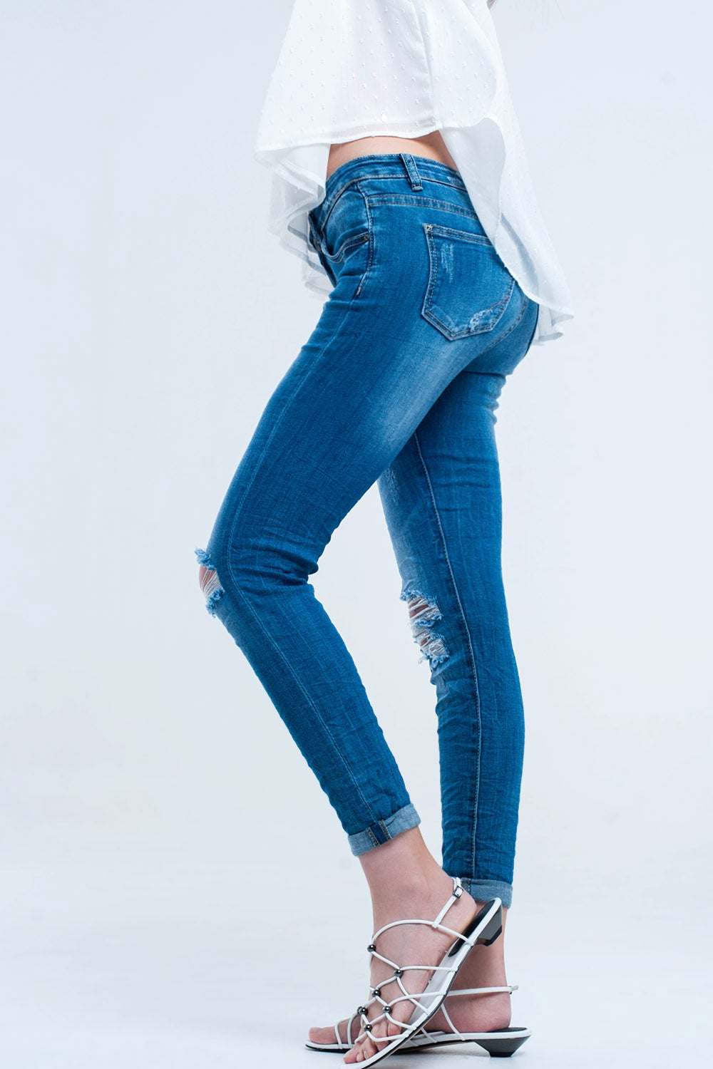 Skinny elastic jeans with ripsJeans
