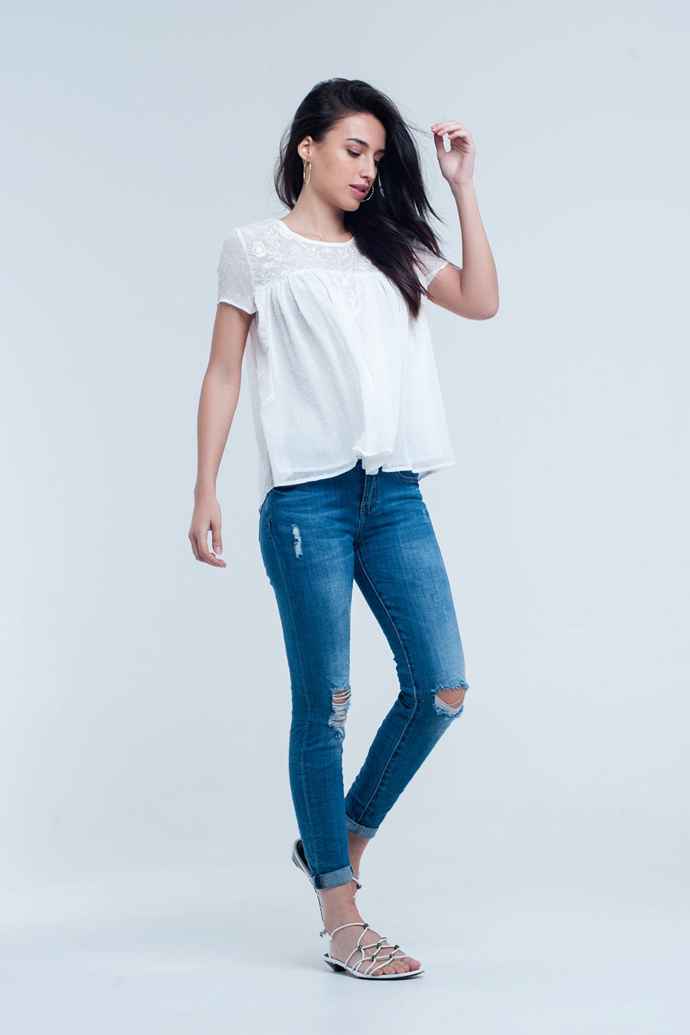 Skinny elastic jeans with ripsJeans