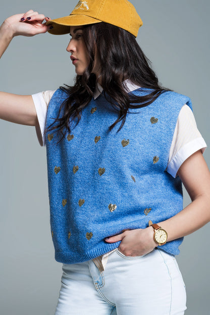 Sleeveless sweater in blue with silver sequin hearts