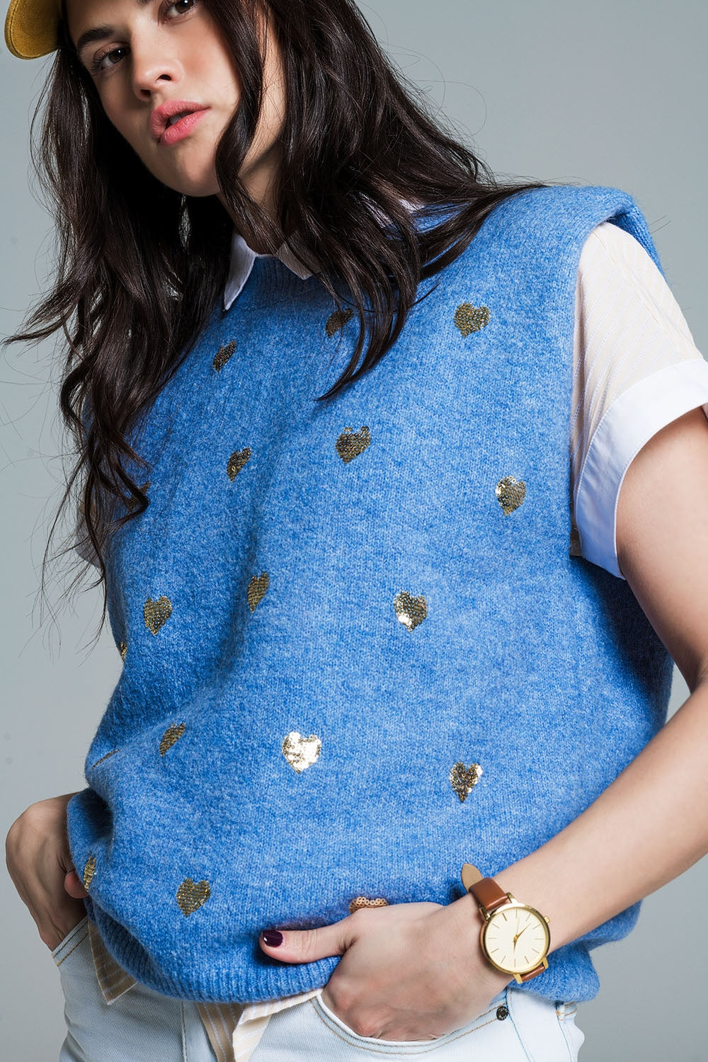 Sleeveless sweater in blue with silver sequin hearts