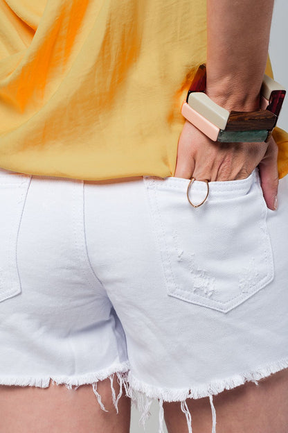 White denim shorts with embroidered flowersJeans