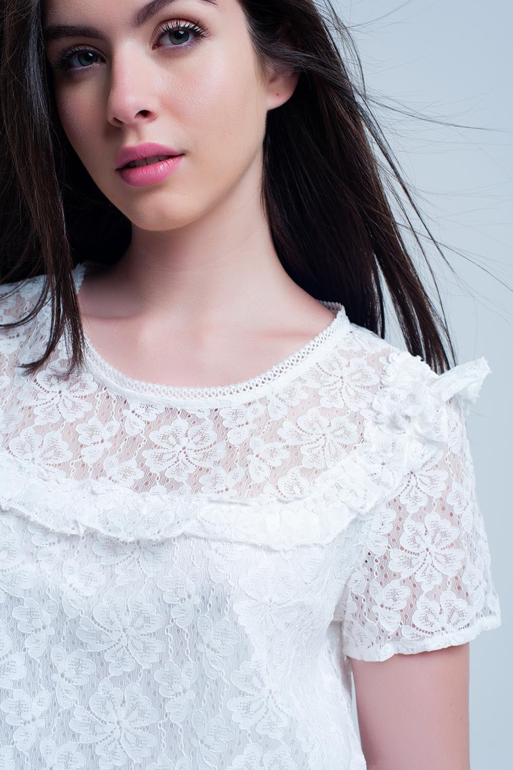 Q2 White embroidered top