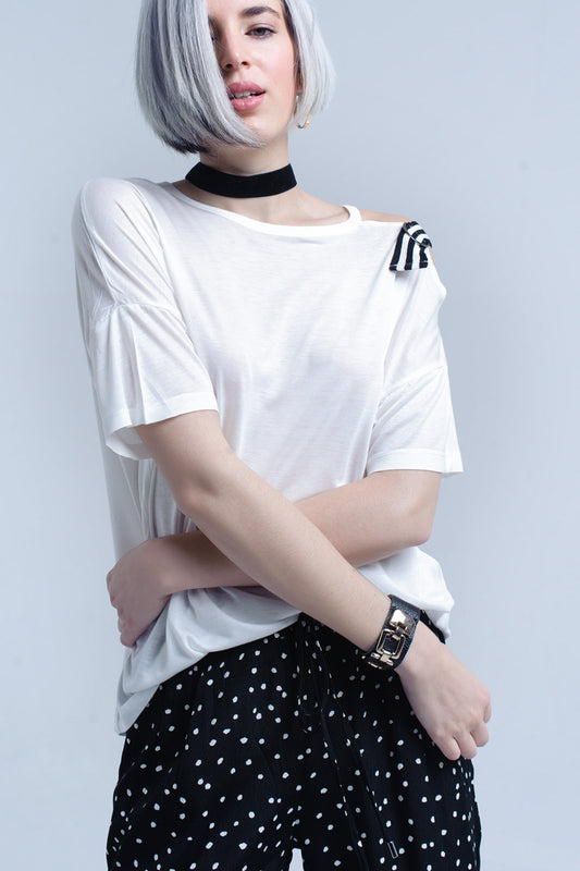 Q2 White t-shirt with one open shoulder