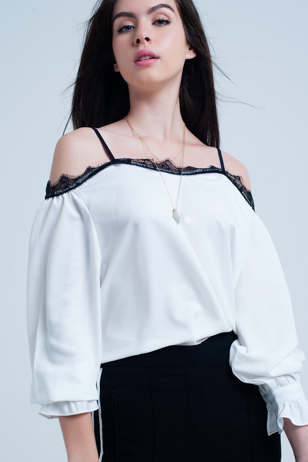 Q2 White top with black lace and bare shoulders