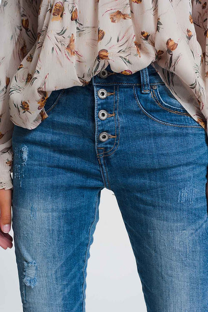 Wrinkled boyfriend jeans in light denim with ripped detailsJeans