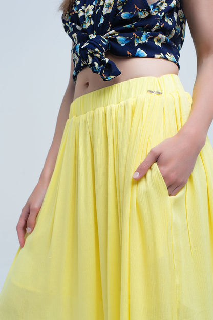 Yellow maxi skirt with pocketsSkirts